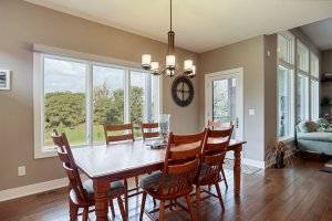 Eat in dining room with view to backyard and door to patio.