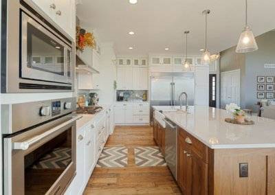 White kitchen with island.