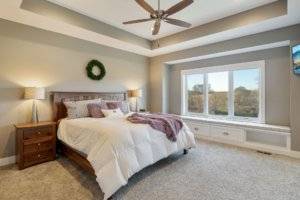 Premier bedroom with trayed ceiling.