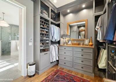 Primary closet, custom built in shelves and storage